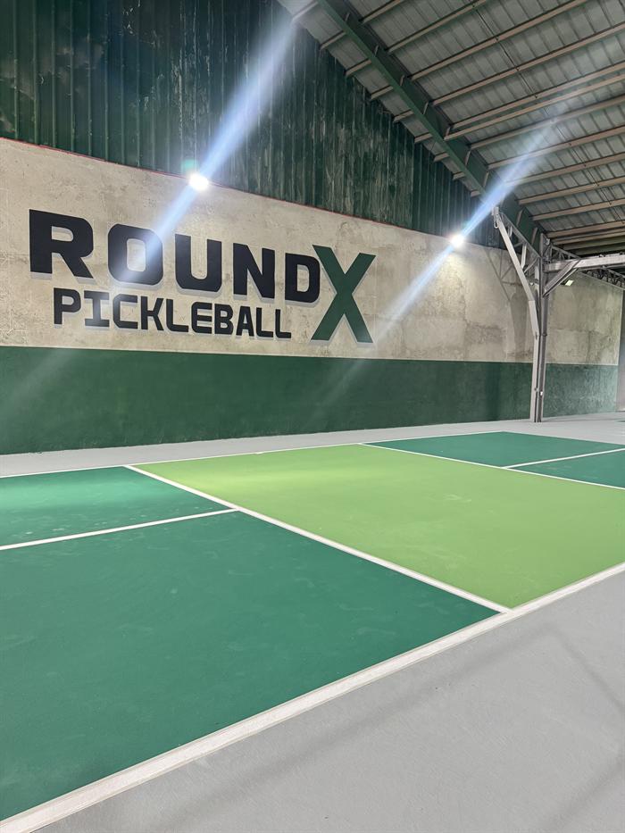 The Round X courts and wall